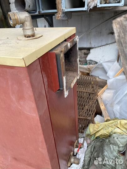 Твердотопливный Котёл отопительный водогрейный