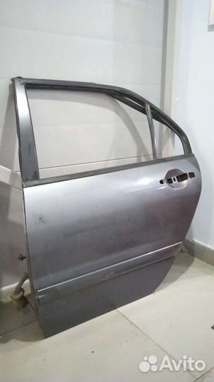 Дверь задняя левая Лансер 9