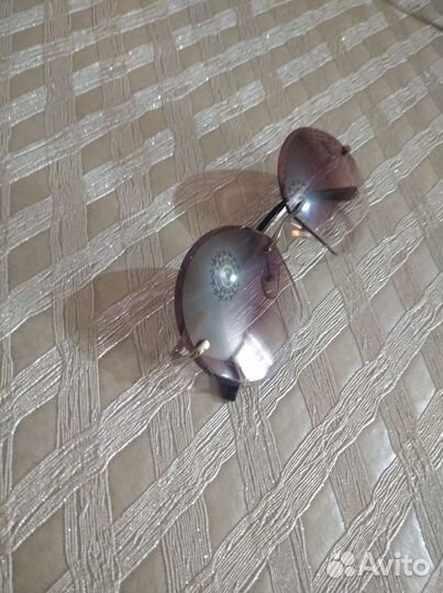 Солнцезащитные очки женские брендовые