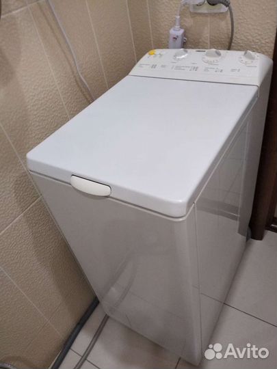 Стиральная машина с вертикальной загрузкой