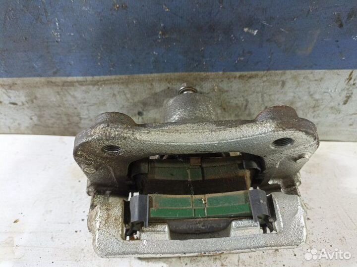 Суппорт тормозной задний левый Kia Optima JF