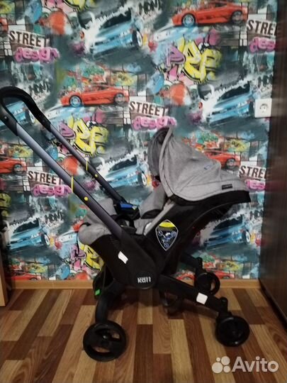 Коляска автолюлька