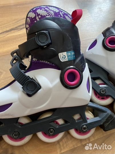 Роликовые коньки