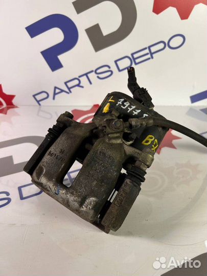 Суппорт тормозной задний левый Vw Passat B7 1.4