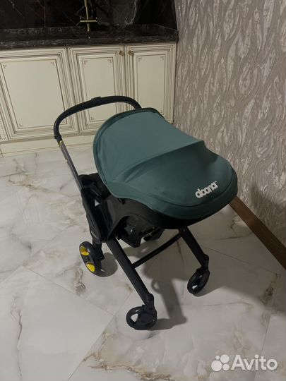 Коляска автокресло doona plus