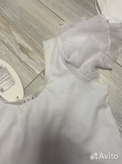 Купальник спортивный новый 128