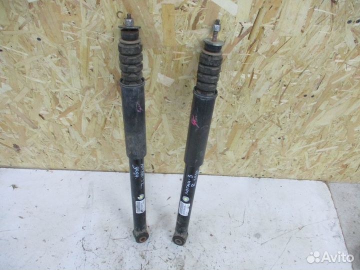 Амортизатор задний Рено Логан 1 2014