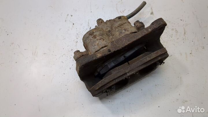 Суппорт левый передний Subaru Forester (S12)