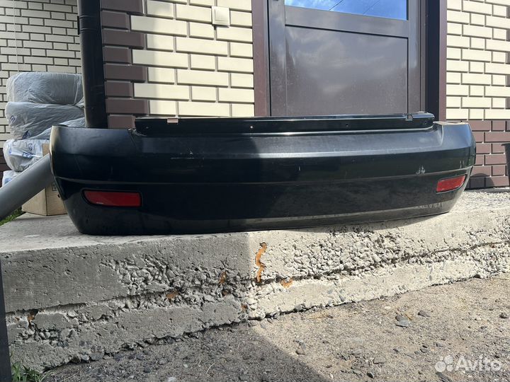 Бампер черный priora