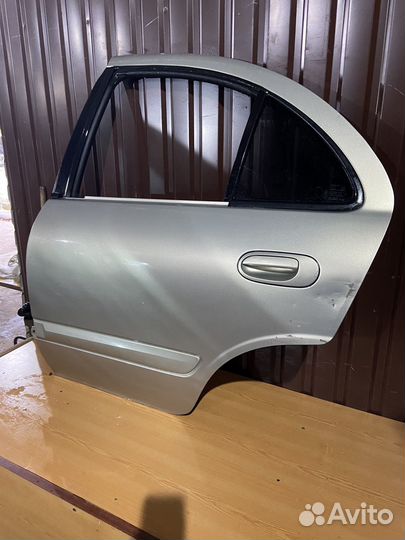 Задняя левая дверь на ниссан альмера классик
