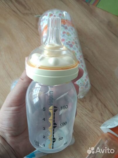 Ручной молокоотсос medela, бутылочка calma