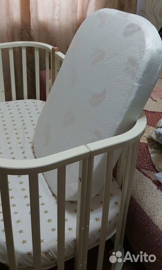 Детская кроватка с поперечным маятником