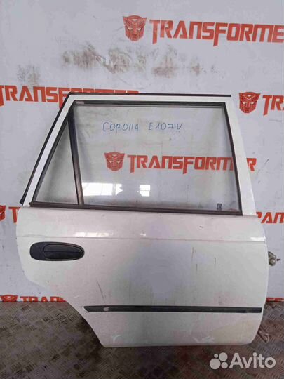 Стекло двери заднее правое Тойота Королла EE107V