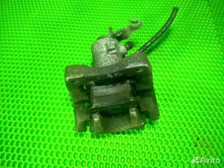 Суппорт задний правый Skoda Octavia II A5