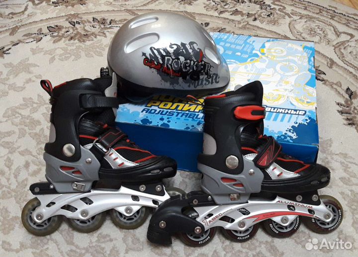 Роликовые коньки и шлем