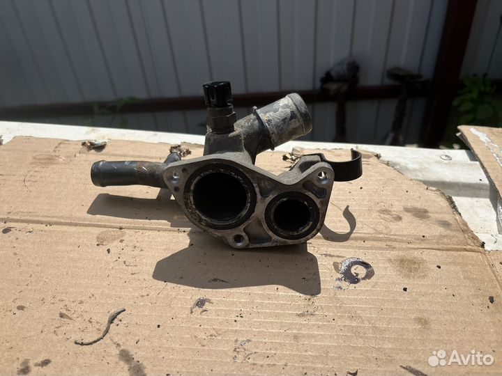 Флянец системы охлаждения на киа сид 2007