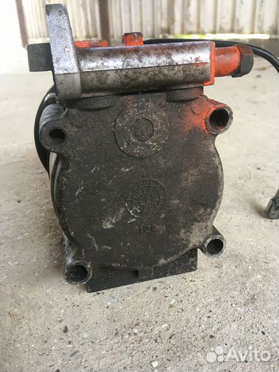 Компрессор кондиционера KIA Sephia