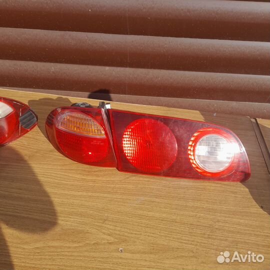 Задний стопсигналы на тайота калдина 215 кузово