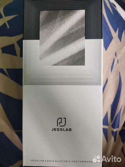 Электрическая зубная щетка