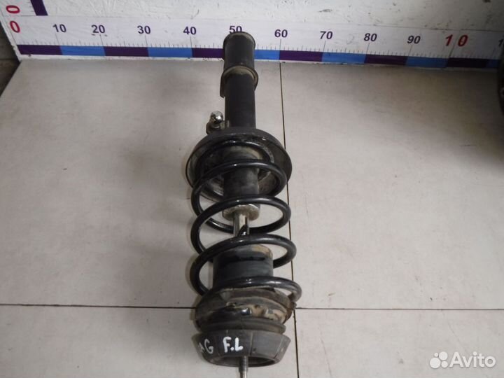 Амортизатор передний левый Opel Astra G