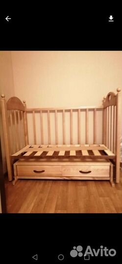 Детская кроватка с маятником и ящиком