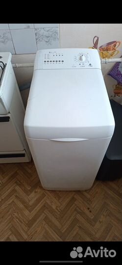 Стиральная машина с вертикальной загрузкой