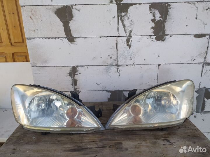 Передние фары Митсубиси Лансер 9