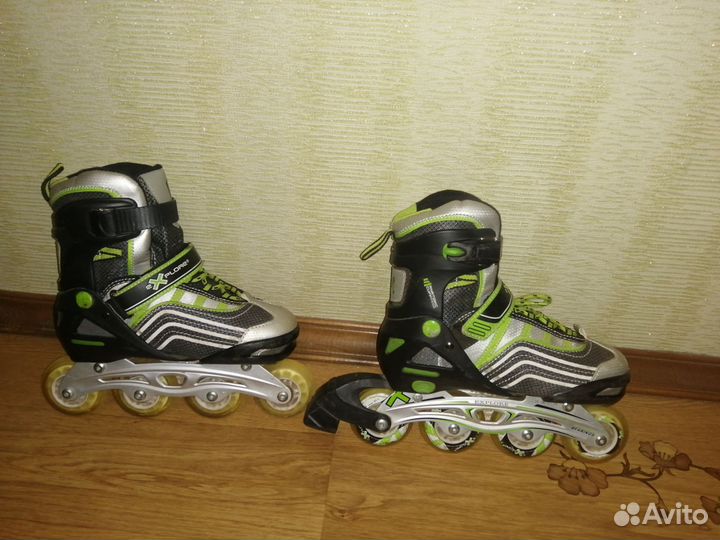 Роликовые коньки