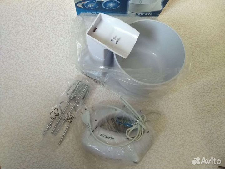 Новый электрический миксер в упаковке