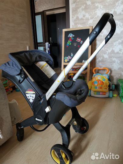 Коляска автокресло doona с базой isofix