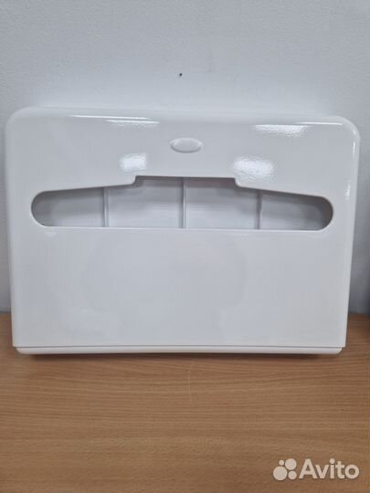 Диспенсер для покрытия на сиденья для унитаза