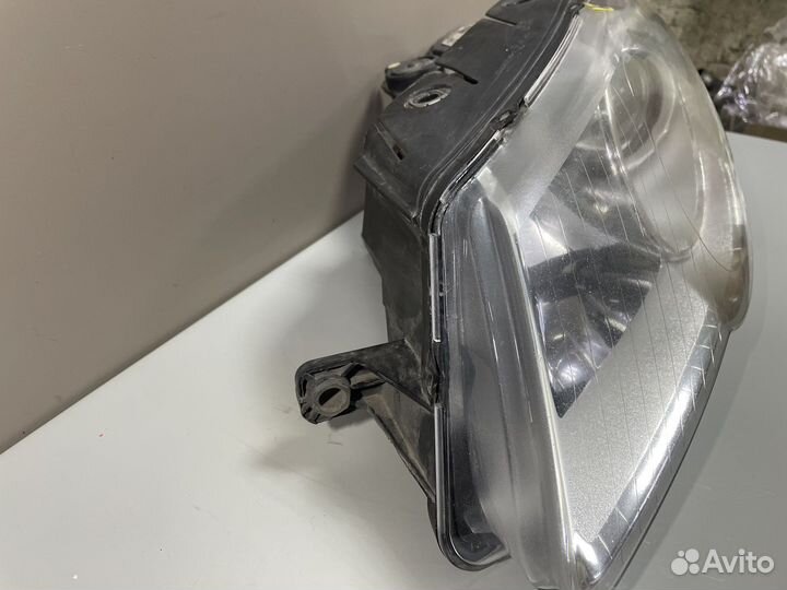 Фара левая Фольксваген Пассат Б6