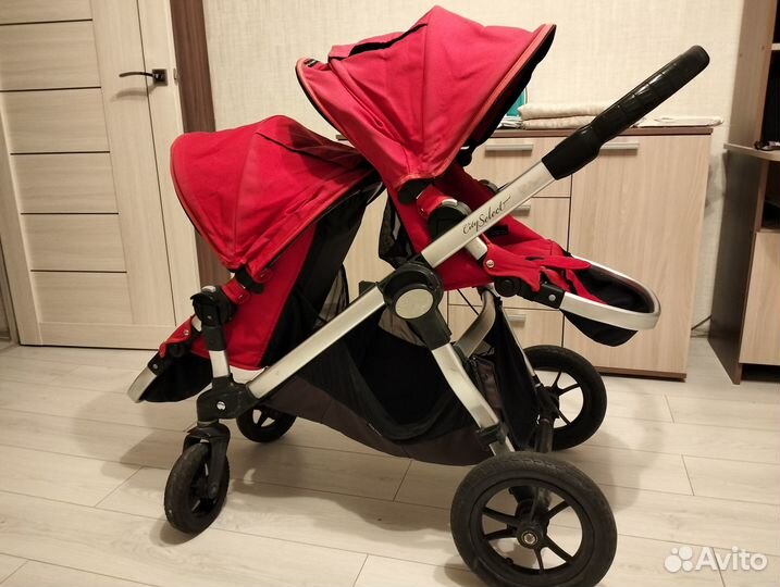 Коляска для погодок baby jogger city select