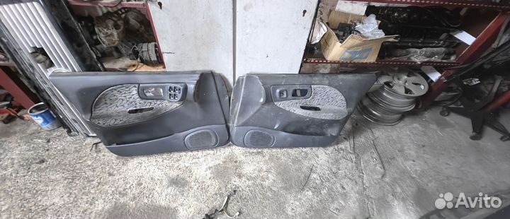 Обшивка карта двери на Субару Импреза 96г