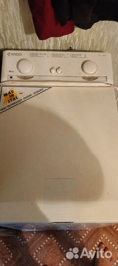 Стиральная машина с вертикальной загрузкой