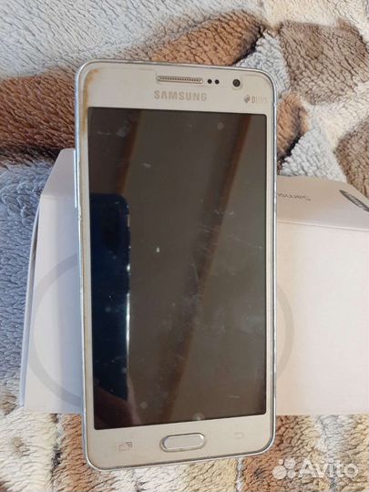 Телефон Samsung Galaxy Grand Prime