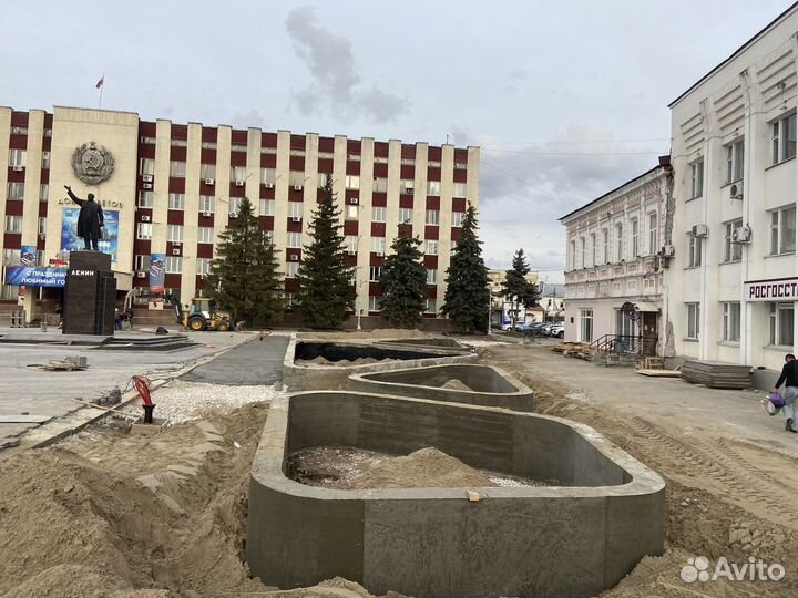 Строители