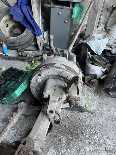 Балка в сборе со стипицами и барабанами на маз