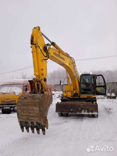 Услуги колесного экскаватора с гидромолотом
