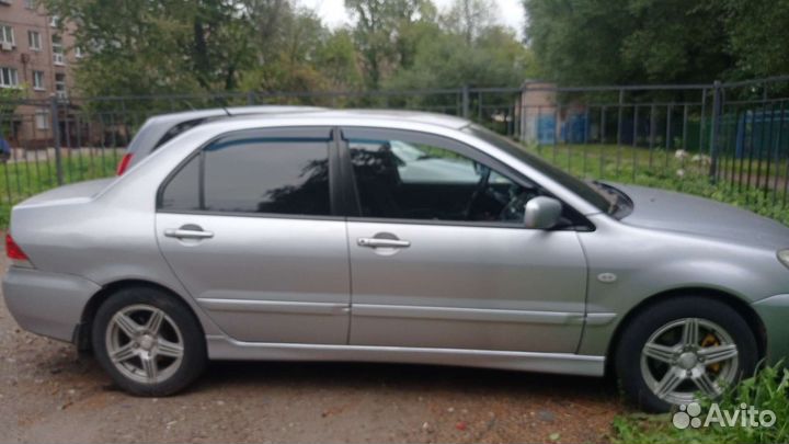 Mitsubishi Lancer 1.6 МТ, 2006, 294 335 км