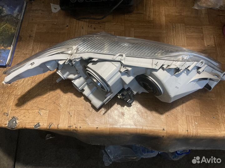 Фара левая оригинал Тойота Камри