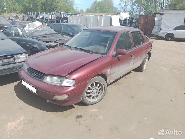 Суппорт правый левый Kia Sephia