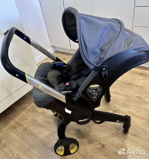 Коляска автокресло doona с базой isofix