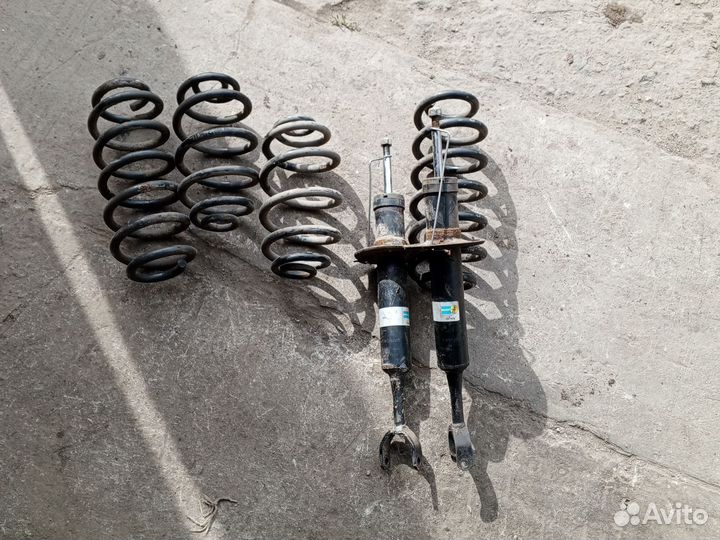 Стойки с пружинами