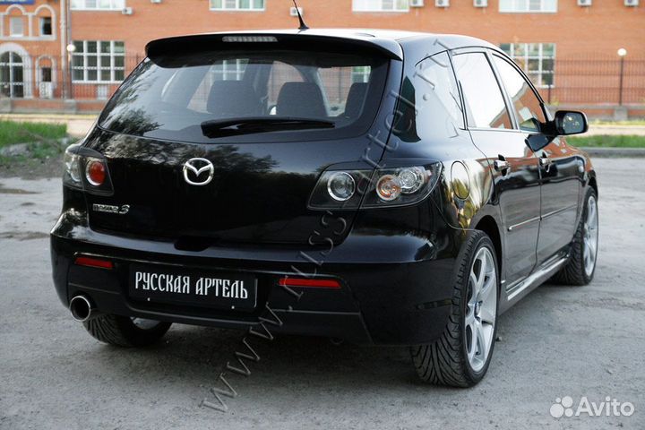 Накладки на задние фары Mazda REM3014800