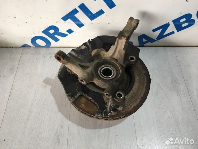 Поворотный кулак передний KIA RIO 2 JB рест 1.6 мт