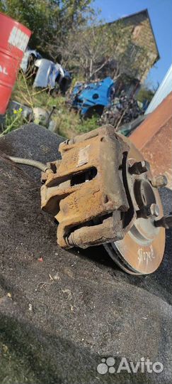 Кулак поворотный левый Пежо 206