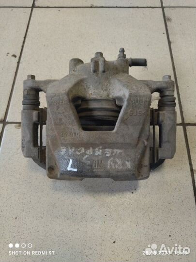 Суппорт тормозной передний левый Chevrolet Cruze
