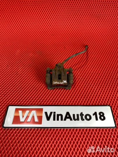 Суппорт тормозной задний левый Hyundai Ix 35 LM