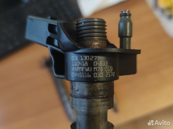 Топливная форсунка 03l130277